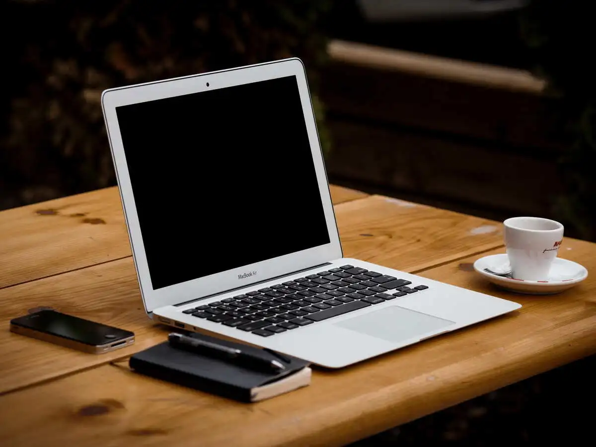 Computer and coffee on working table